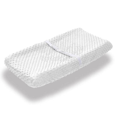 white plush diaper changing pad cover for baby boys and girls with holes in middle for straps